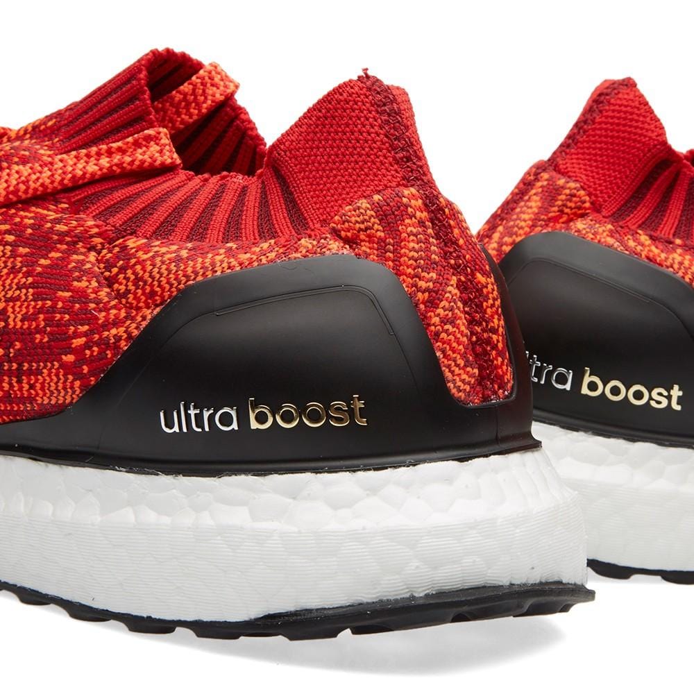 Exclusive ADIDAS ULTRA BOOST UNCAGED Scarlet, Solar Red & Black — UK 3.5 | EU 36 | US 4 — Lifestyle View