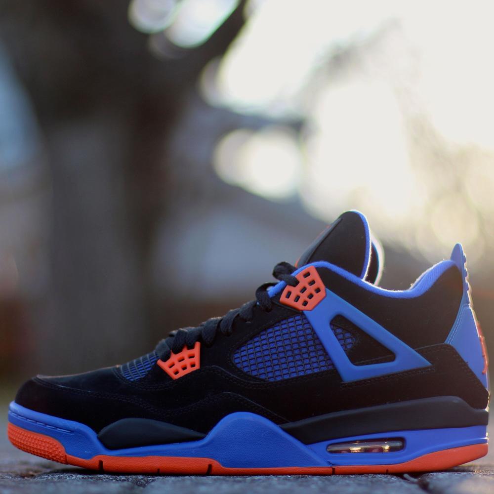 Exclusive Air Jordan 4 Retro 'Cavs' — UK 3 | EU 35.5 | US 3.5 — Lifestyle View