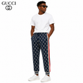 Exclusive Gucci GG Monogram Jogger Pants – Navy Blue with Web Stripe — XS — Front View