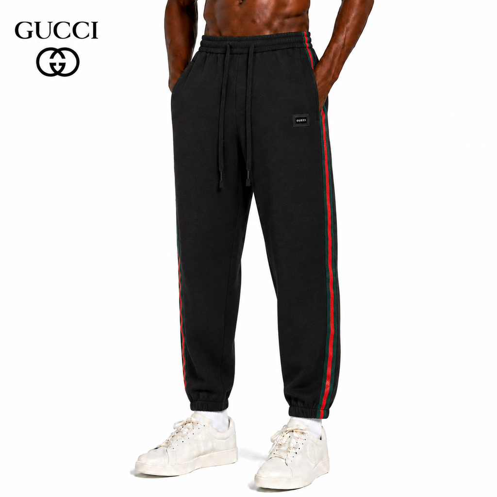 Exclusive Gucci Web Stripe Track Pants in Black — M — Front View