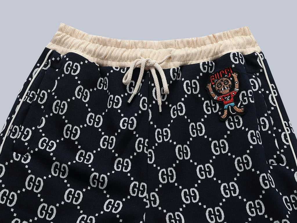 Exclusive Gucci GG Monogram Jogger Pants with Embroidered Crest — S — Top View