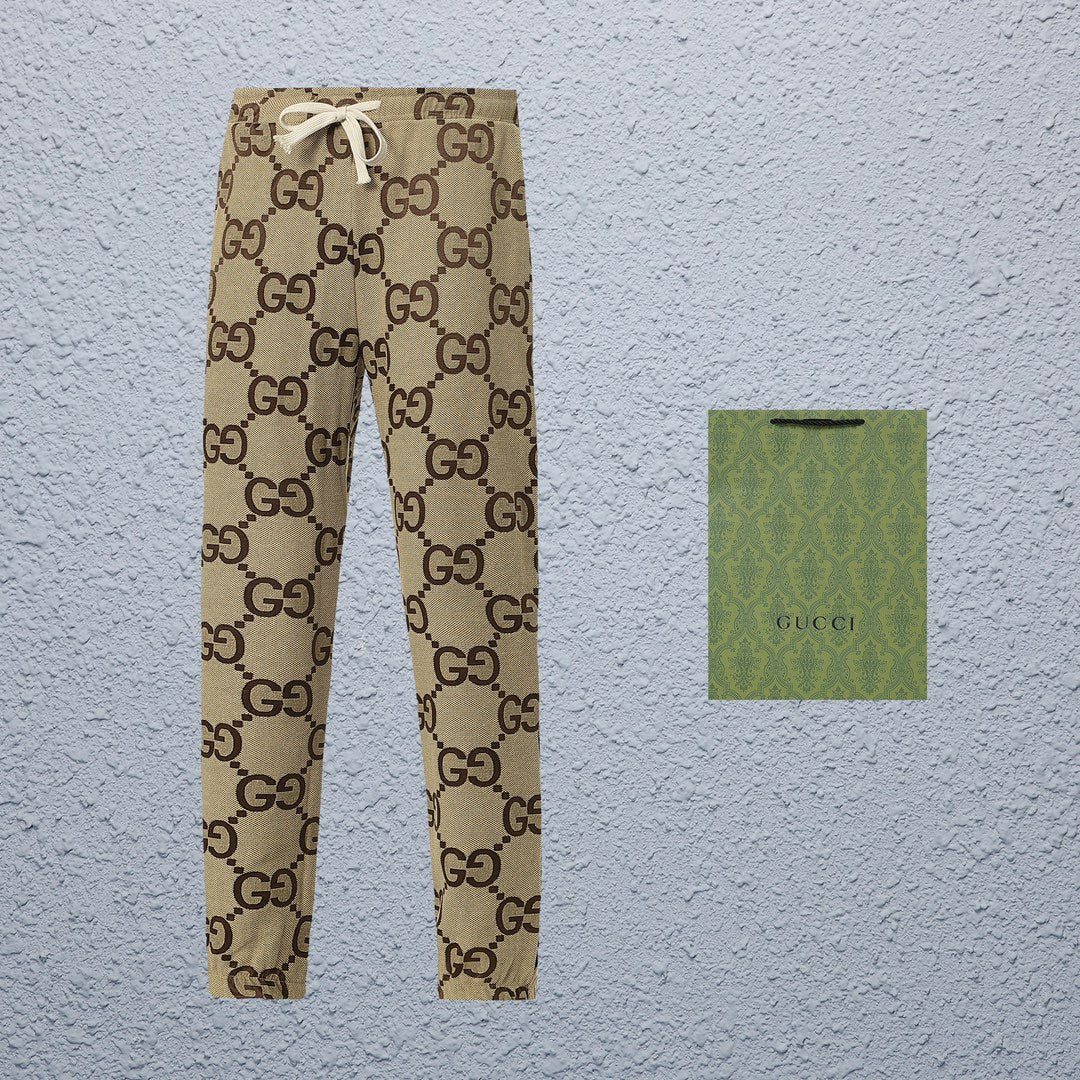 Exclusive Gucci GG Monogram Jogger Pants — S — Side View