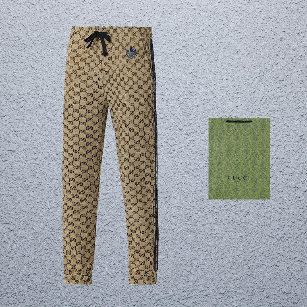 Exclusive Gucci x Adidas GG Monogram Track Pants — S — Side View