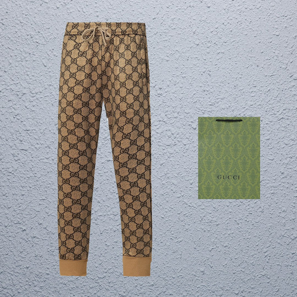 Exclusive Gucci GG Supreme Monogram Jogger Pants — S — Side View