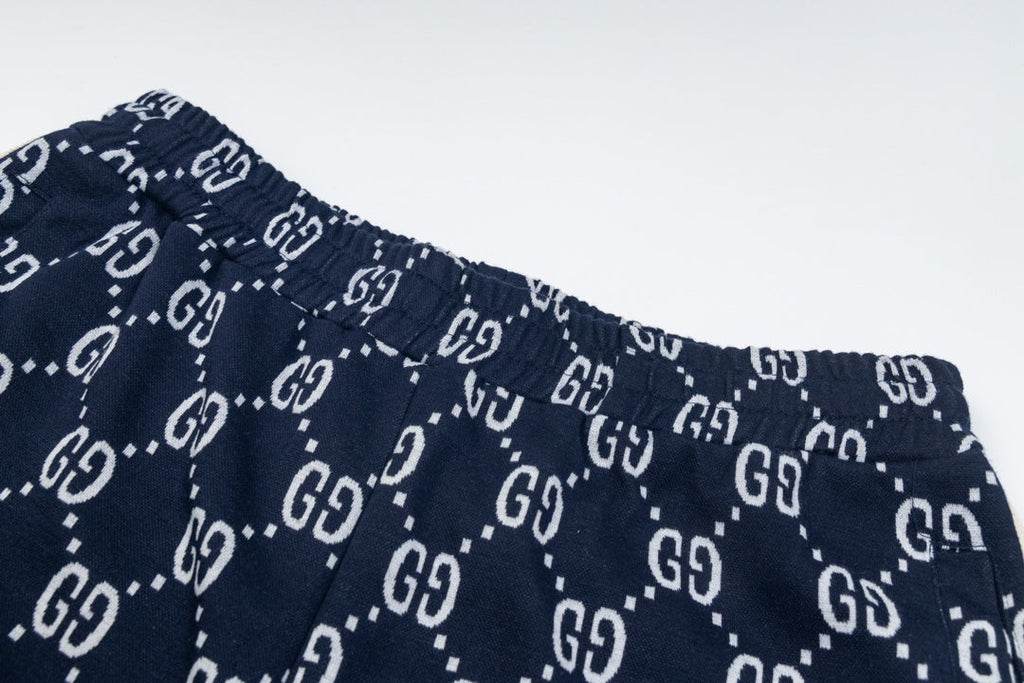 Exclusive Gucci GG Monogram Jogger Pants – Navy Blue with Web Stripe — XS — Top View