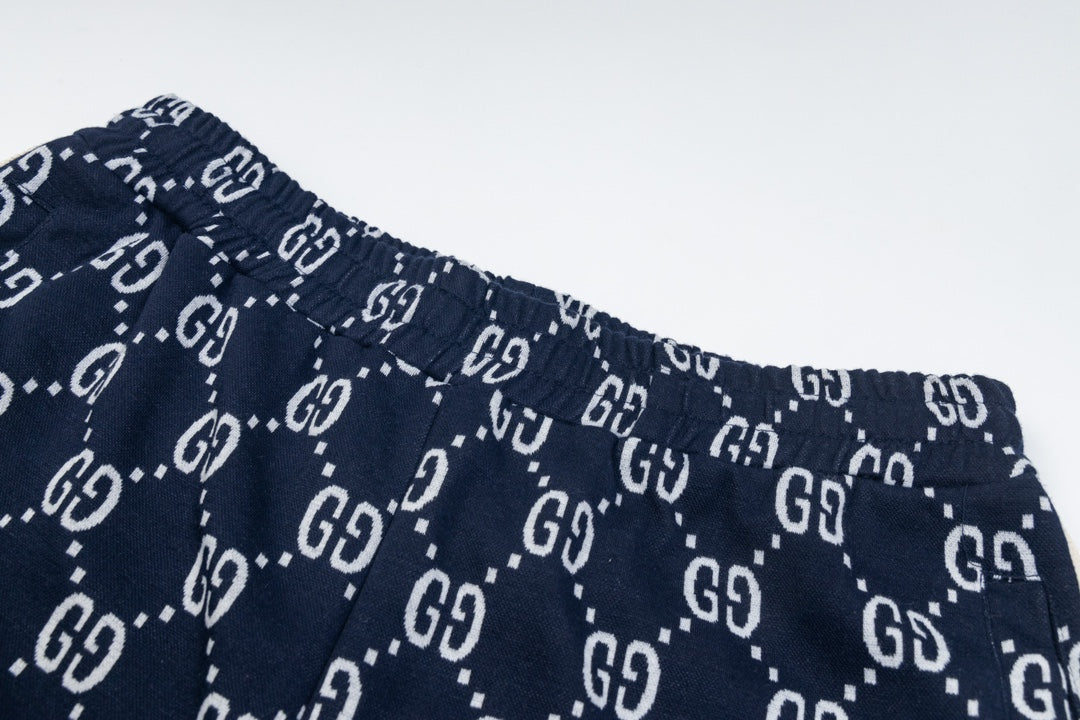 Exclusive Gucci GG Monogram Jogger Pants – Navy Blue with Web Stripe — XS — Top View