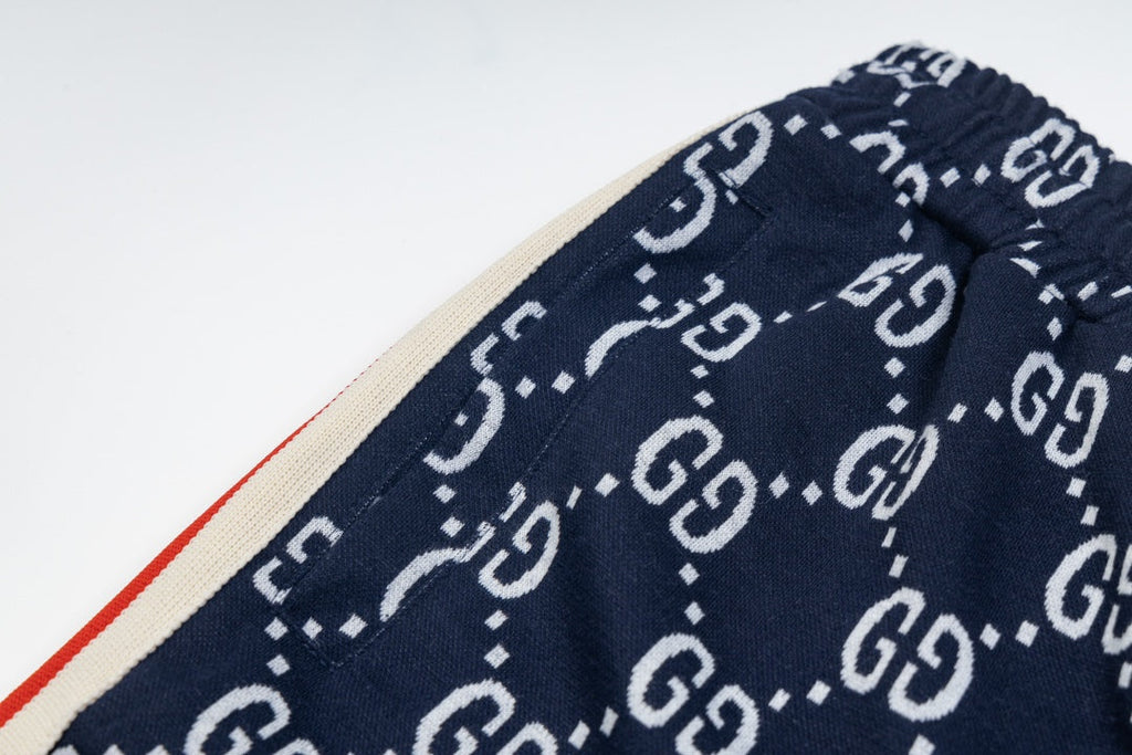 Exclusive Gucci GG Monogram Jogger Pants – Navy Blue with Web Stripe — XS — Lifestyle View