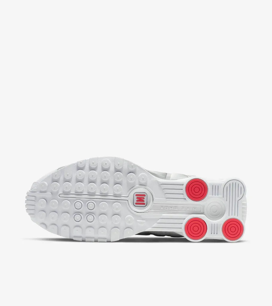 Exclusive Shox R4 White and Metallic Silver — White and Metallic Silver — Size US M 5.5 - UK 5 - EUR 38 — Lifestyle View
